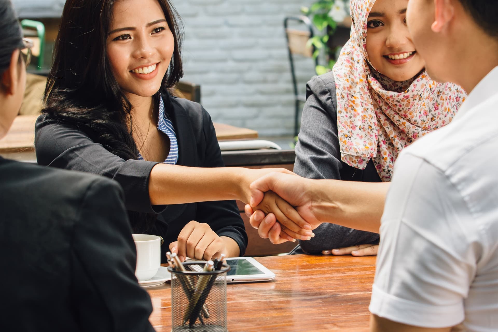 Two colleagues shaking hands